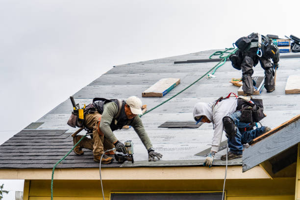 Professional Roofing technician working in Baskett, KY